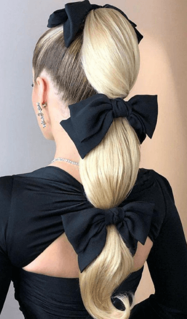 High-Twist-Ponytails-With-Triple-Bows